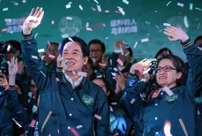 Taiwan President-elect Lai Ching-te celebrates victory at an election day rally.